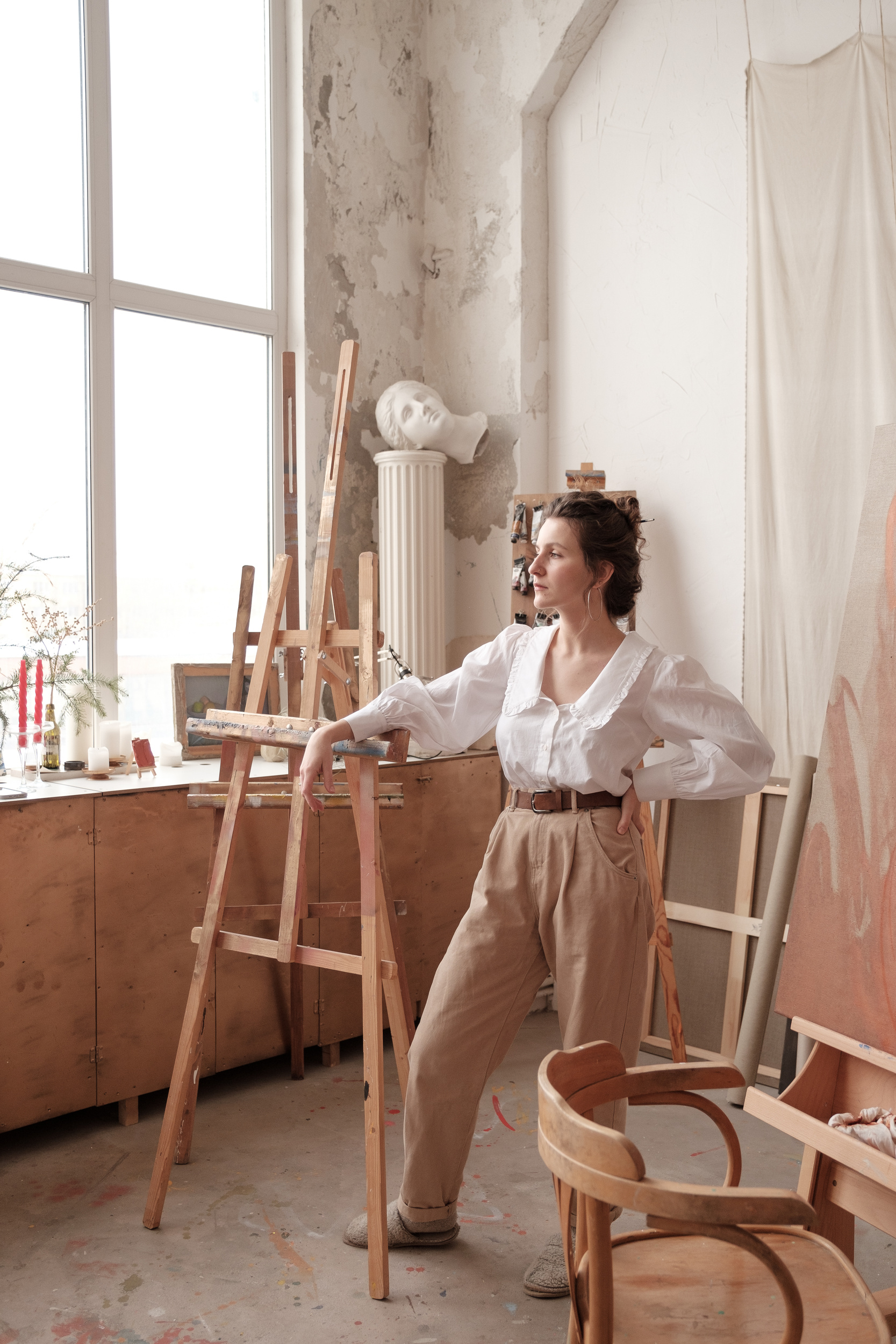 Woman Standing in Art Studio